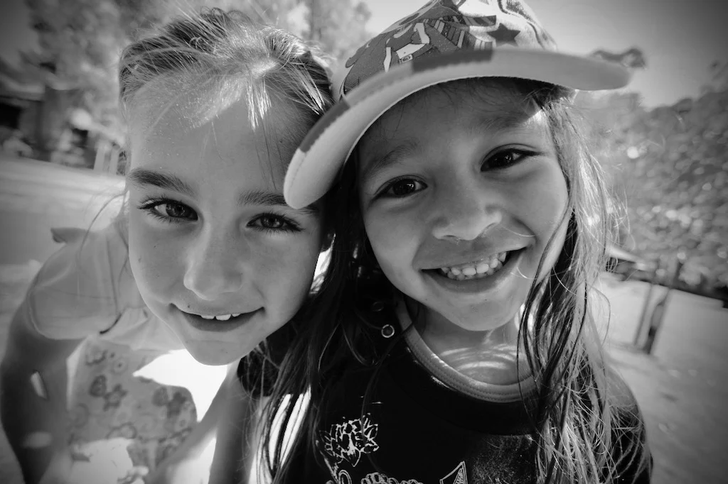Two happy children smiling