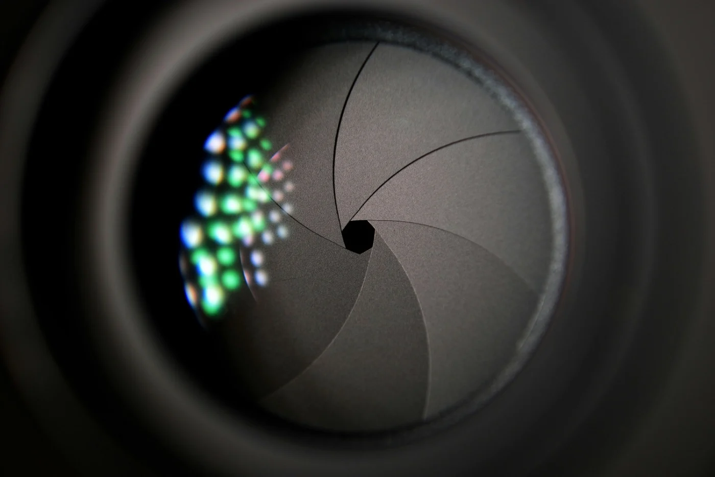 Camera lens iris aperture blades