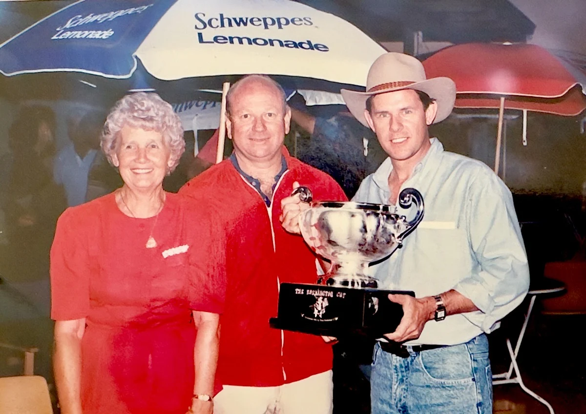 Joan Pickering, Laurie Connell & Peter Pickering with The Burlington Cup polo trophy