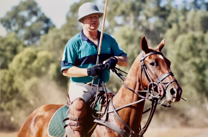 Laurie Connell playing polo at King's Meadow by Peter Pickering