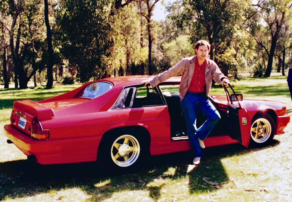 Peter Pickering at Perry Lakes in Perth, having restored his red Jaguar XJS V12